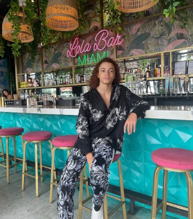 Jaylin Fletcher is posing for the photo at Miami Beach.